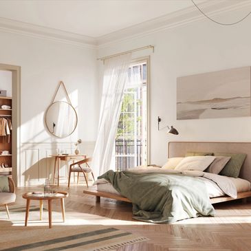 Bright and airy bedroom with natural wood furniture and soft green accents